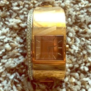 Armani Exchange rose gold cuff watch